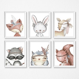 May include: Six printable nursery art prints featuring woodland animals with headdresses. The animals include a fox, rabbit, deer, raccoon, owl, and squirrel. Each animal is depicted in a whimsical style with soft colors.