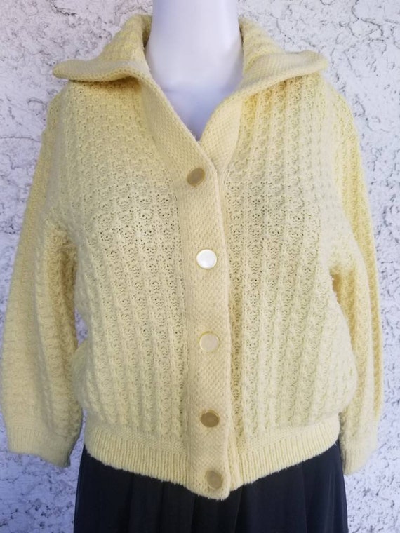 pastel yellow cardigan