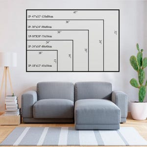 May include: A white wall with a diagram showing five different sizes of framed prints. The print sizes are 47"x32", 36"x24", 30"x20", 24"x16", and 18"x12". The diagram is labeled with the corresponding measurements in inches and centimeters.