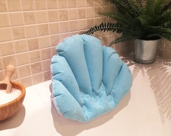 Almohada de baño con forma de concha: cojín de spa inflable e impermeable de tela de rizo.