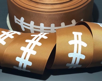May include: Brown satin ribbon with white football stitching design.
