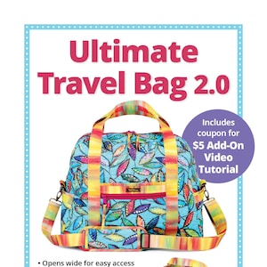 May include: A blue and yellow travel bag with a leaf pattern. The bag has a zipper closure, side handles, and a padded shoulder strap. It also has a trolley sleeve to secure it to rolling luggage. The bag is carry-on compliant. The text "Ultimate Travel Bag 2.0" is at the top of the image. The text "Includes coupon for $5 Add-On Video Tutorial" is in a purple circle at the top right of the image. The text "byannie.com ... what's in your bag?" is at the bottom left of the image. The text "The perfect travel companion!" is at the bottom right of the image.