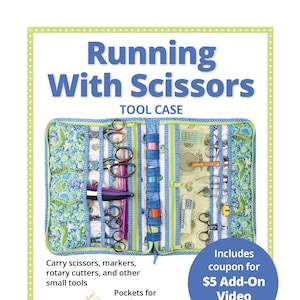 May include: A blue and green fabric tool case with the text "Running With Scissors Tool Case" and "byannie.com ... what's in your bag?"  The case is open and shows pockets for scissors, markers, rotary cutters, and other small tools.  It also includes a coupon for a $5 add-on video tutorial.