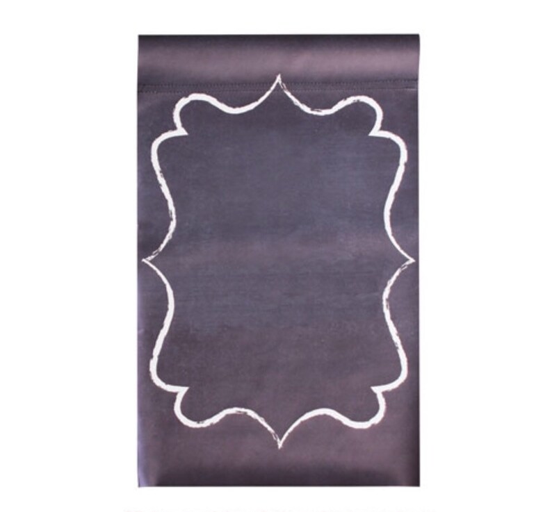 May include: A black chalkboard with a white decorative frame. The chalkboard is blank and ready to be written on.