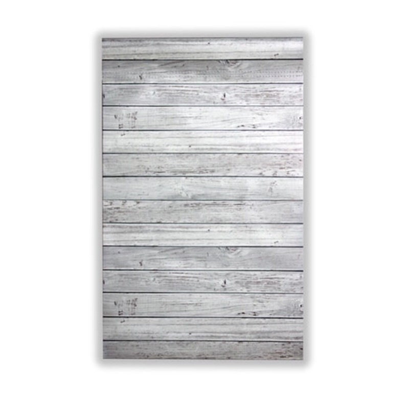 May include: Whitewashed wood background with a horizontal plank pattern. The wood has a distressed, weathered look.