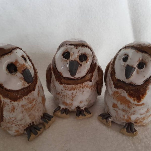 A parliament of owls. Priced per owl.