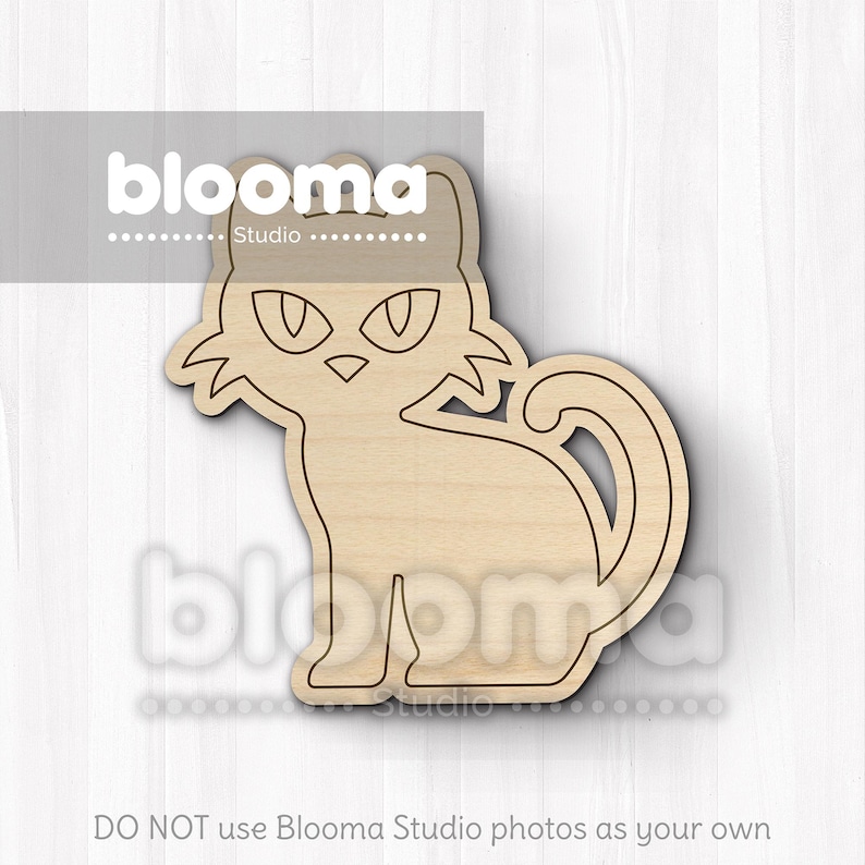May include: A wooden cat-shaped cutout with a stylized design. The cat is sitting with its tail curled and has large, pointed ears and eyes. The cutout is made of light-colored wood and is suitable for crafts.