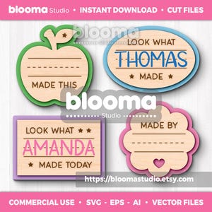 May include: Four wooden craft labels in various shapes: an apple, an oval, a rectangle, and a flower. Each label has space for a name and a phrase like "Made This" or "Made Today." The labels are in green, blue, purple, and pink.