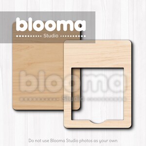 May include: Two wooden frames, one solid and one with a square cutout, are displayed. The frames are light brown and have rounded corners. The word "blooma" is visible in white text at the top and bottom of the image, along with the word "Studio".