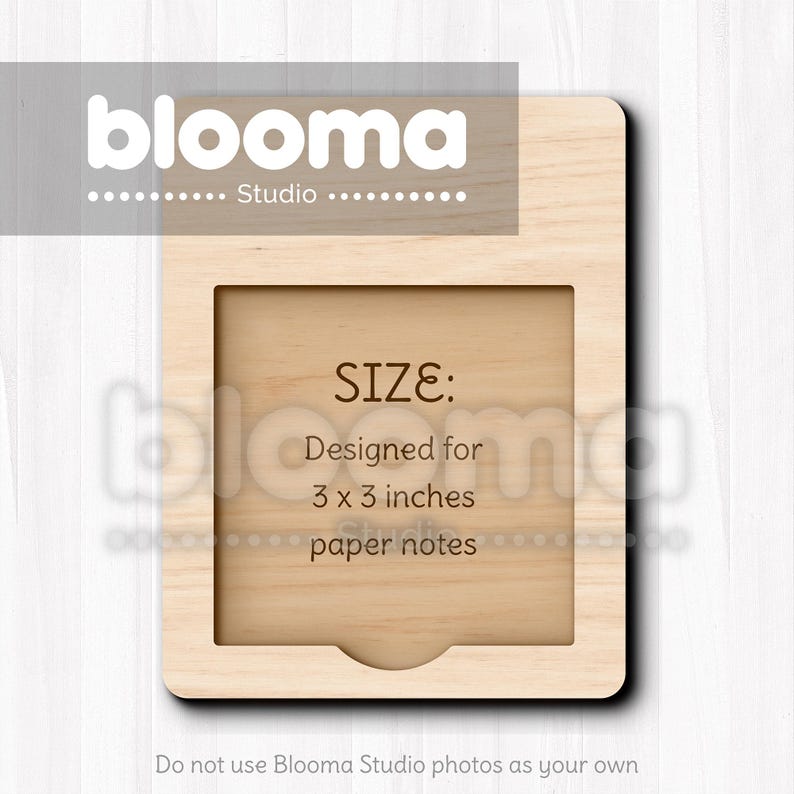 May include: A light-colored wooden frame with a recessed square area designed for 3 x 3 inch paper notes. The text "SIZE: Designed for 3 x 3 inches paper notes" is visible. The Blooma Studio logo is at the top.