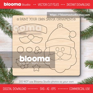 Peut inclure: Kit d'ornement de Père Noël découpé au laser en bois avec le texte "PAINT YOUR OWN SANTA ORNAMENT". Le kit comprend le chapeau, le visage, la moustache et d'autres éléments décoratifs du Père Noël. Parfait pour les bricolages de Noël.