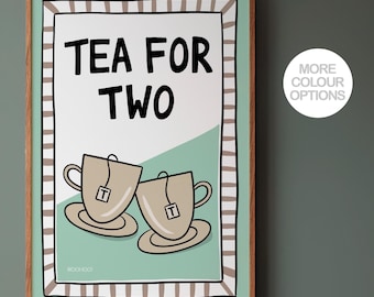 May include: A teal and brown framed print with the text "TEA FOR TWO" and a cartoon illustration of two teacups with tea bags. The print has a striped border.