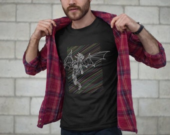 May include: A black t-shirt with a white geometric dragon design on the front. The dragon is surrounded by colorful diagonal lines. The shirt is being modeled by a person wearing a red and black plaid shirt.