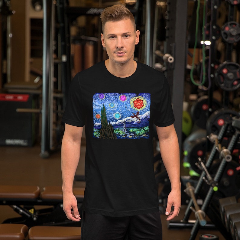 以下が含まれることがあります： 黒いTシャツ。ゴッホの「星月夜」にインスパイアされたカラフルなグラフィックで、ファンタジー要素が加えられています。D20サイコロ、ドラゴン、その他の要素が含まれており、アートとゲームを融合させています。柔らかい素材で作られています。