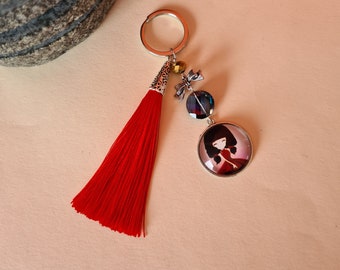Porte-clés cabochon et pompon rouge