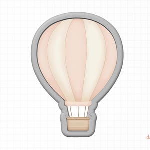 May include: A gray metal cookie cutter shaped like a hot air balloon with a pink and white striped balloon and a brown basket.