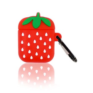 May include: A red silicone AirPod case shaped like a strawberry, with white seed details and a green stem. The case has a black carabiner clip attached for easy carrying. The case is designed to protect and personalize your AirPods.