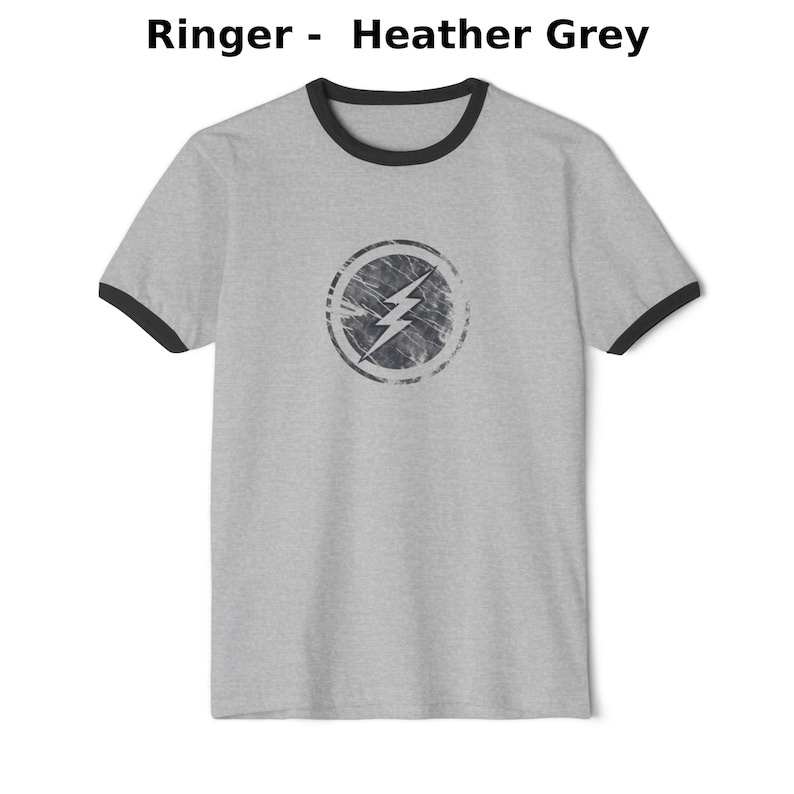 Distressed lightning bolt graphic t-shirt with circular emblem printed on ringer and classic cotton tees in multiple color options