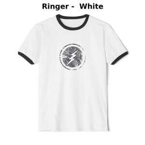 Distressed lightning bolt graphic t-shirt with circular emblem printed on ringer and classic cotton tees in multiple color options