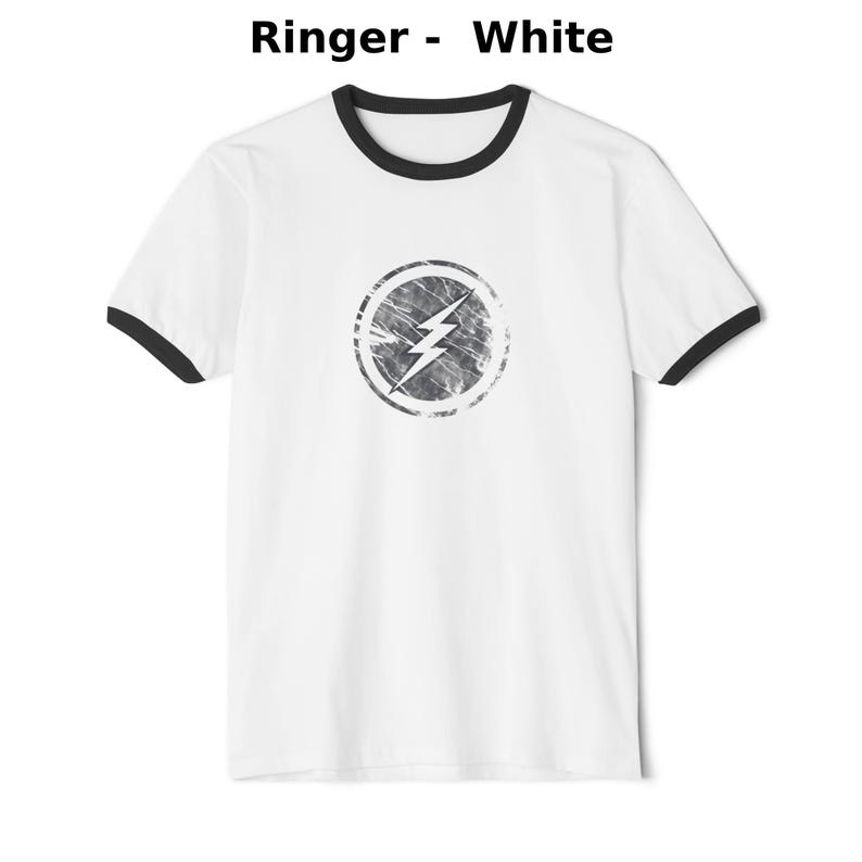 Distressed lightning bolt graphic t-shirt with circular emblem printed on ringer and classic cotton tees in multiple color options