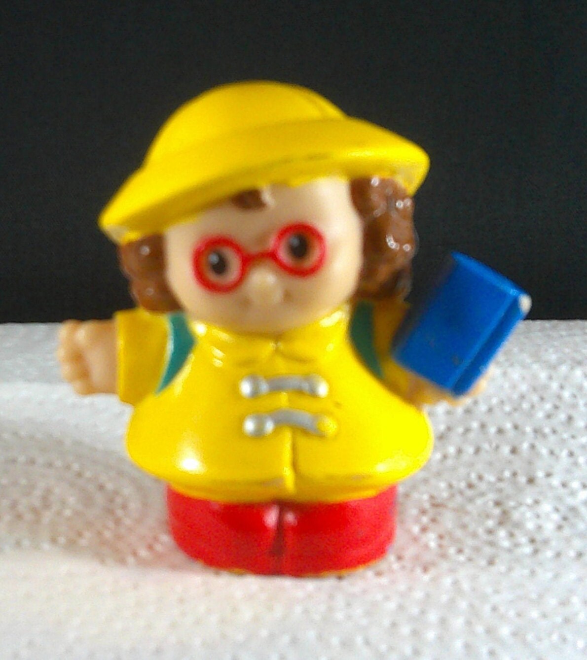 Fisher Price Little People Girl in Yellow Rain Coat With Book 