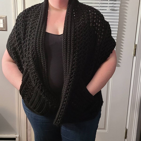 a shawl with pockets