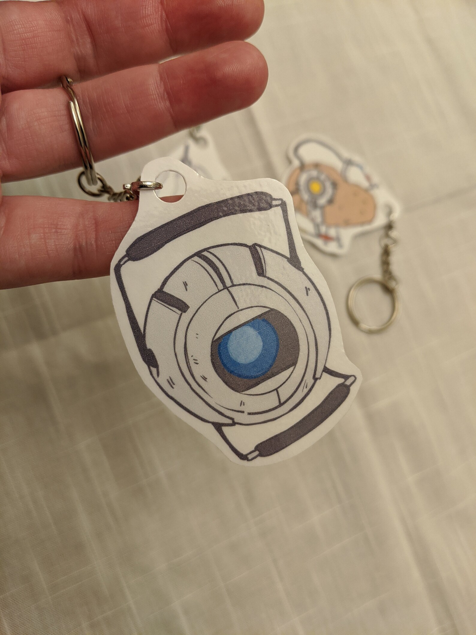 Portal Themed Handcut Laminated Paper Keychain Etsy