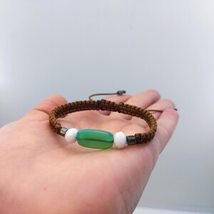 Braided bracelet made of cord and beads in boho style, Bracelet made of waxed cord and glass beads with ethnic style.