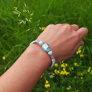 Braided bracelet made of cord and beads in boho style, Bracelet made of waxed cord and glass beads with ethnic style.