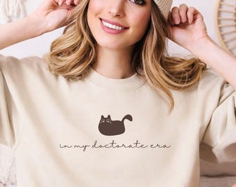 In My Doctorate Era Sweatshirt, PhD Graduation Crewneck, Doctoral Student Sweater, PhD Gift for Her, Grad Student Sweater, Doctorate Shirt
