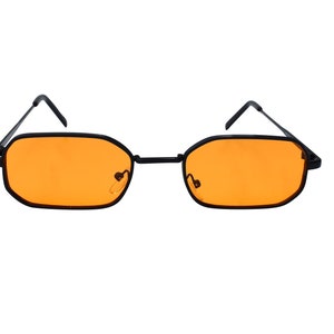 May include: Black rectangular frame sunglasses with orange lenses.