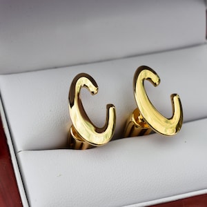 Gemelos de oro con la letra "C" de los años 70, con iniciales bañadas en oro amarillo. Gemelos Hickok dorados sin usar. Fabricados en EE. UU., vintage de alta calidad sin usar.