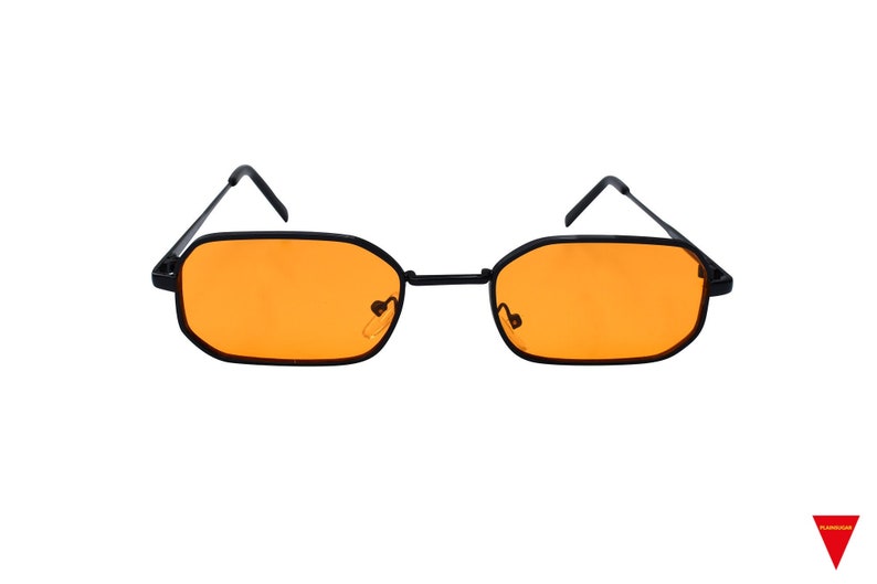 May include: Black rectangular frame sunglasses with orange lenses.