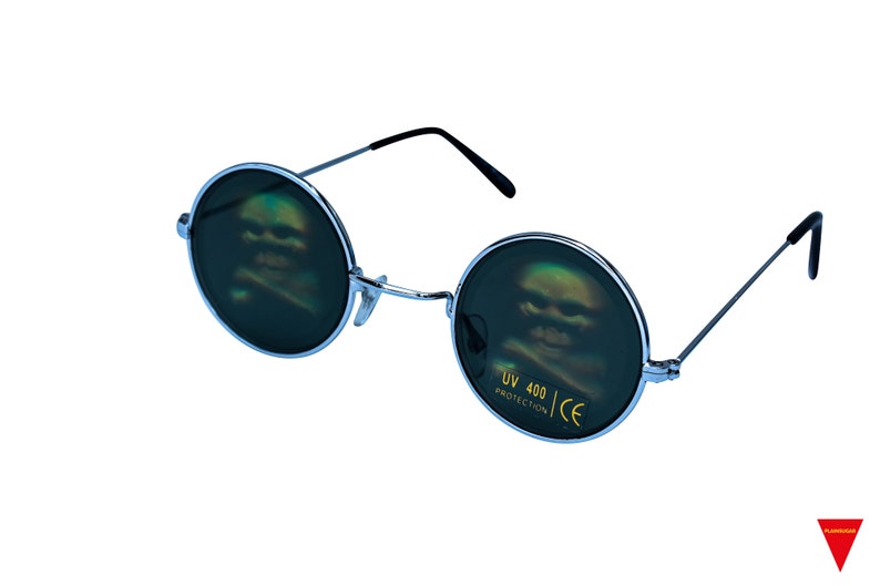 May include: Round, silver-framed sunglasses with dark blue lenses. The lenses have a reflective, iridescent effect, showing a blurry image of a face. The sunglasses have black arms and the text "UV 400 PROTECTION CE" is printed in yellow on the right lens.