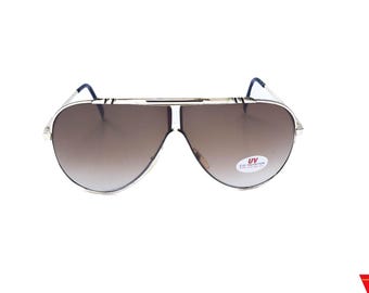 Vintage 1980s Gold Aviator Sunglasses: Unworn Metal Frame, UV Protection