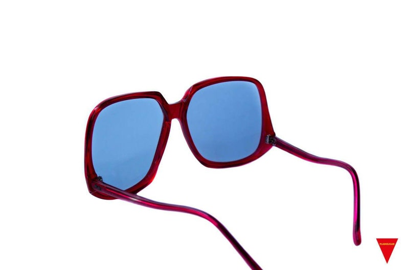 Original 1970s Beautiful Oversized Vintage Red Sunglasses, Metal reinforced frames with light dark level transitional lensed. This image 4