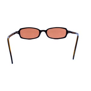 May include: Oval-shaped sunglasses featuring a dark brown tortoiseshell frame and tinted orange lenses. The glasses have thin, curved temples and a bridge connecting the two rims. The design is simple with a smooth finish on the frame edges.