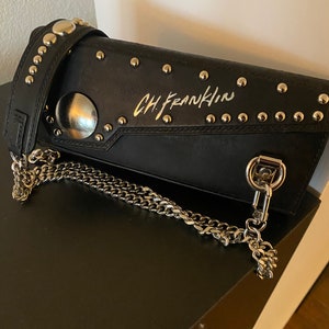 Cartera de mano larga tipo sobre para el hombro Outlaw