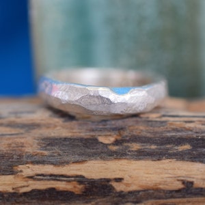 Handcrafted Textured Silver Band Ring with a rustic, unusual, unique and organic texture. Recycled Silver