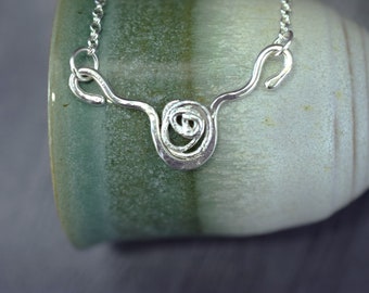 Recycled Silver Pendant with a reticulated finish and spiral design