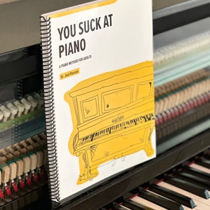 You Suck At Piano 50 simple piano arrangements that teach the fundamentals of piano playing and music theory in a humorous way. image 2