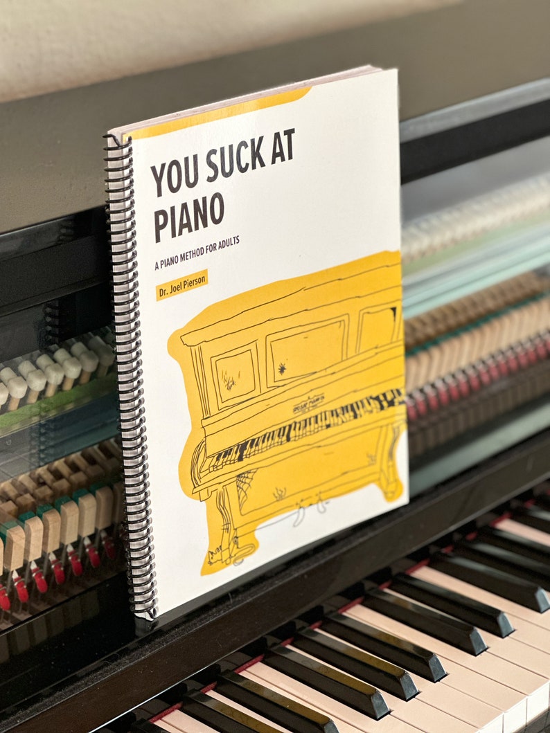 You Suck At Piano 50 simple piano arrangements that teach the fundamentals of piano playing and music theory in a humorous way. image 2