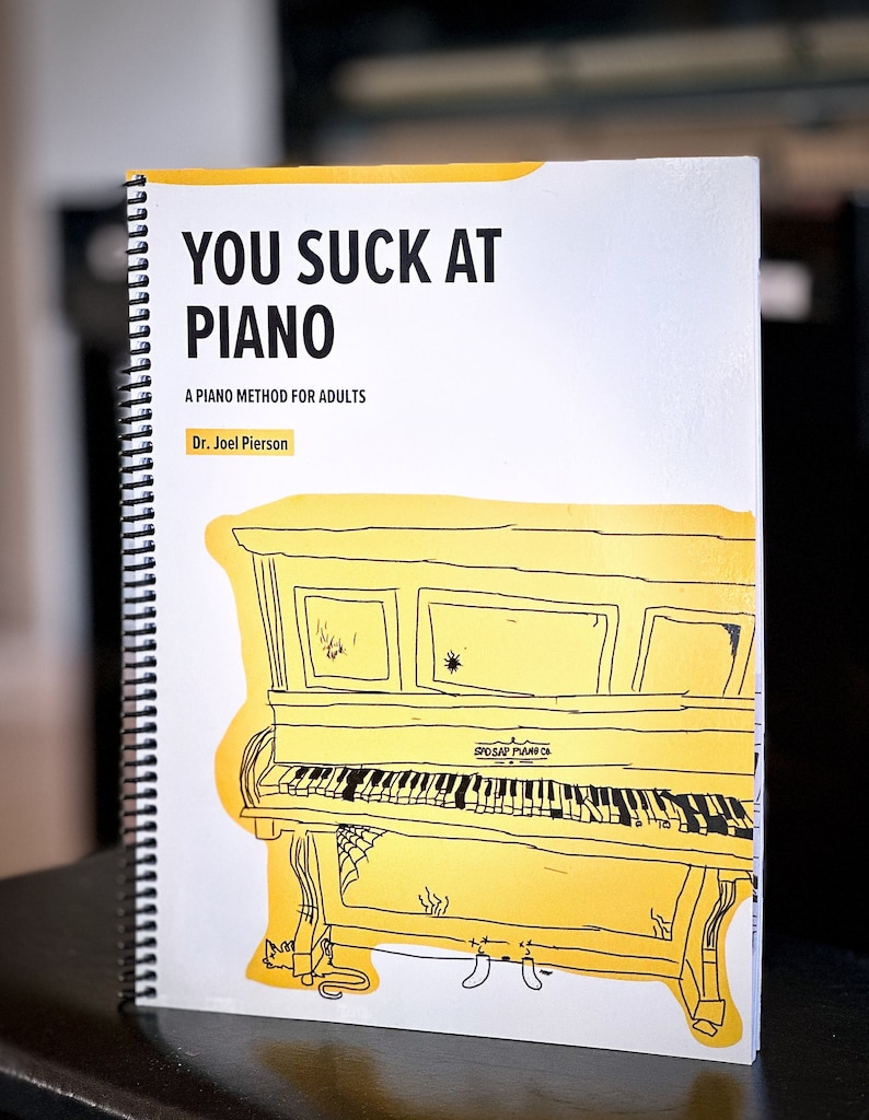 You Suck At Piano 50 simple piano arrangements that teach the fundamentals of piano playing and music theory in a humorous way. image 1