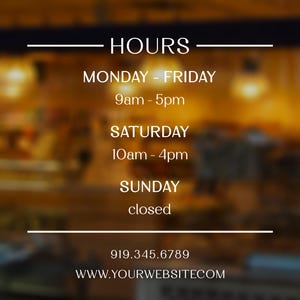 May include: A sign displaying business hours. The text reads "HOURS" at the top, followed by the days of the week and corresponding times: Monday-Friday 9am-5pm, Saturday 10am-4pm, and Sunday closed. A phone number and website address are also included.