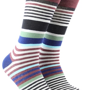 May include: A pair of striped socks in shades of brown, blue, green, and white. The socks have a horizontal striped pattern.