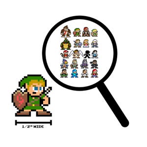 May include: Pixelated image of Link from The Legend of Zelda, with a shield and sword, next to a magnifying glass showing various pixel art characters. The image is 1.27 cm wide, as indicated by the text.