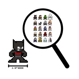 May include: A pixel art style figurine of Batman, standing with his arms crossed, wearing a black suit with a red bat symbol on the chest. The figurine is 1/2 inch wide. A magnifying glass shows a grid of 25 pixel art characters, including Superman, Wonder Woman, and other superheroes.