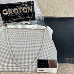 Boxed Vintage OROTON Clutch Handbag