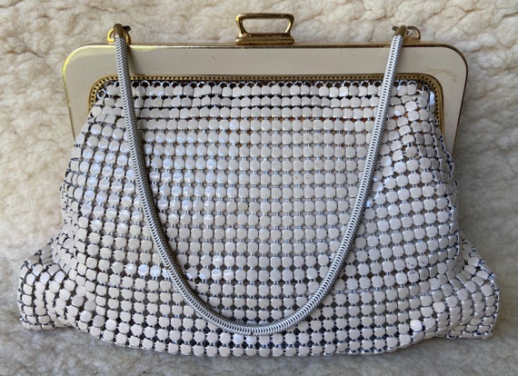 glomesh clutch bolsa
