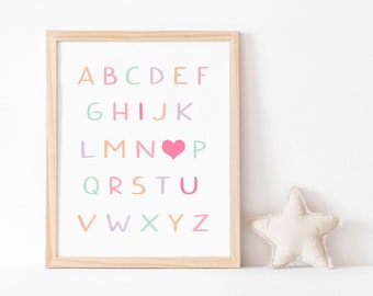 May include: A framed print with the alphabet in colorful letters, with a pink heart replacing the letter "O".